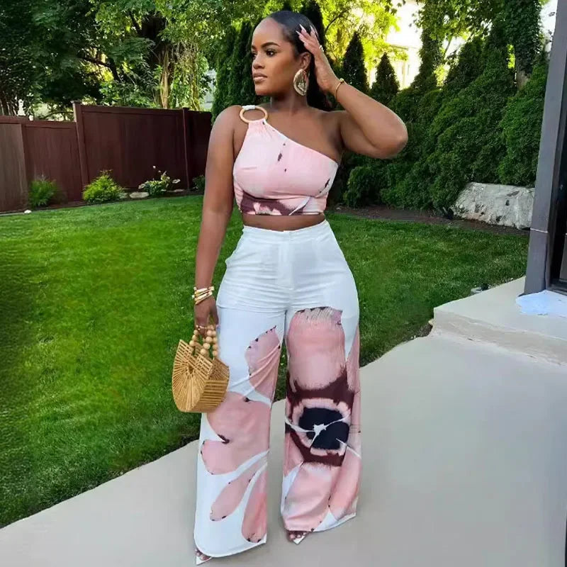 Conjunto Tropical Bloom: Elegância e Frescor para Suas Férias