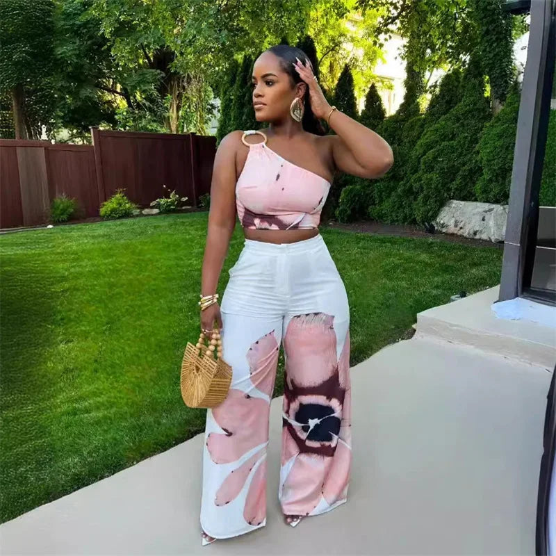 Conjunto Tropical Bloom: Elegância e Frescor para Suas Férias
